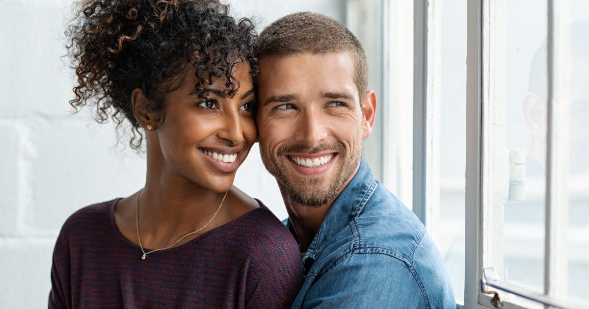 A happy couple promotes lip filler injection in San Clemente, CA.